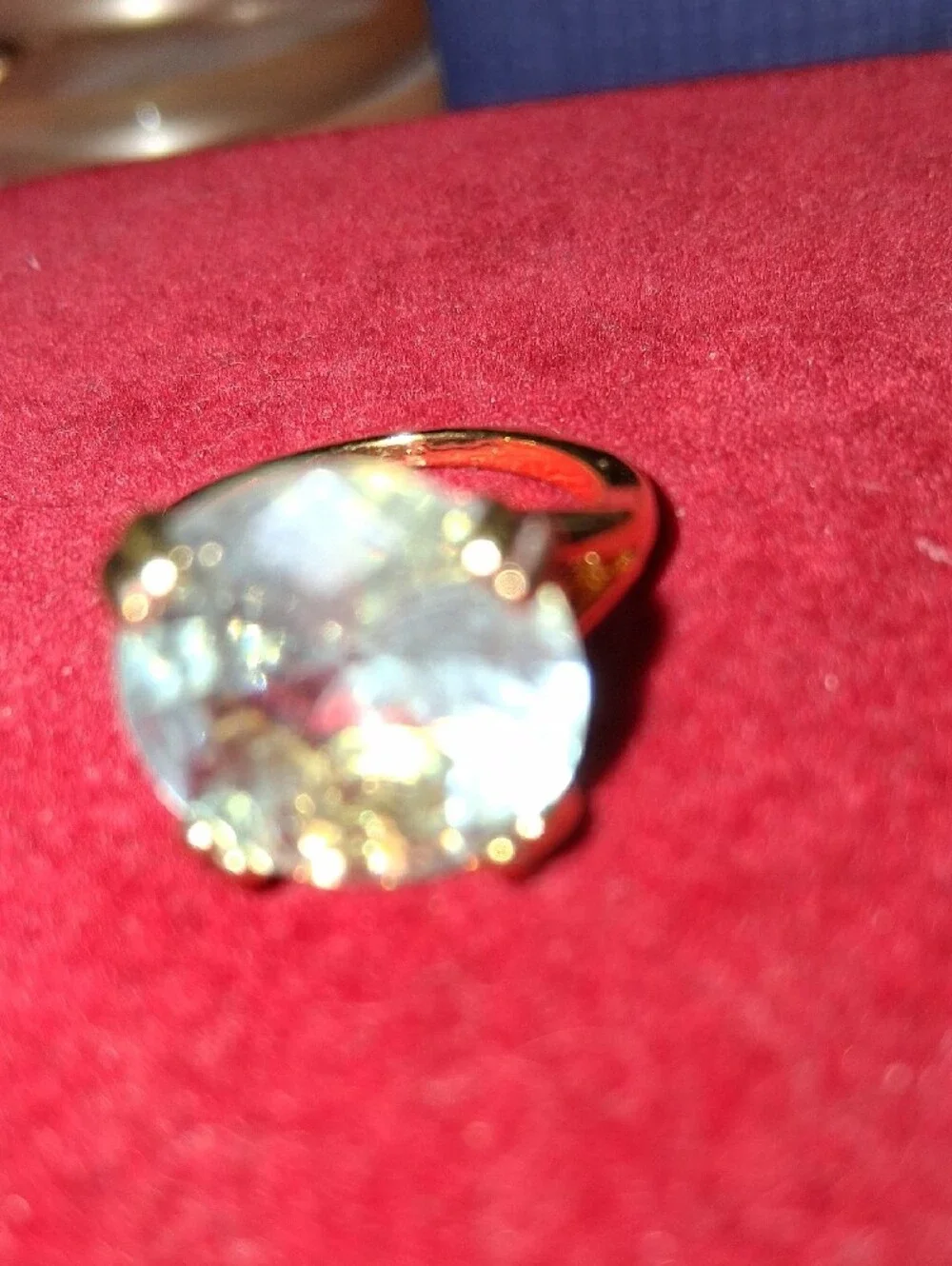 Source Unknown Gold Ring with Light Blue Round Stone
